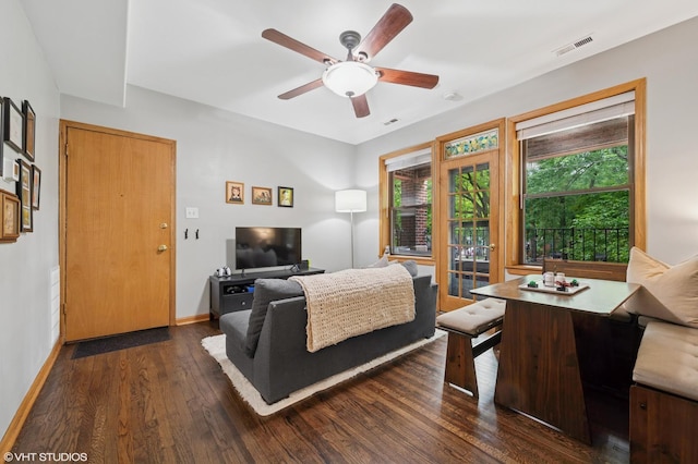 2235 N Saint Louis Ave Unit 1, Chicago, IL 60647 - bedroom with dark wood-style floors, baseboards, and a ceiling fan