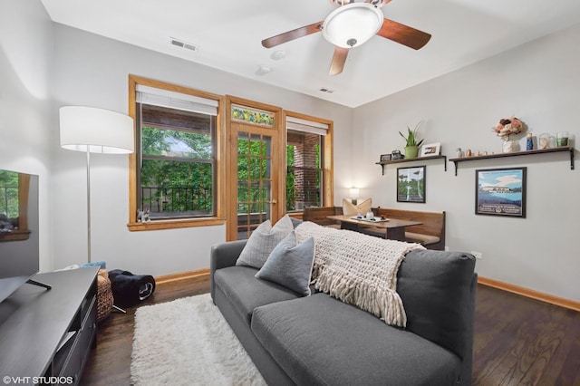 2235 N Saint Louis Ave Unit 1, Chicago, IL 60647 - living area featuring baseboards, dark wood-style flooring, and a ceiling fan