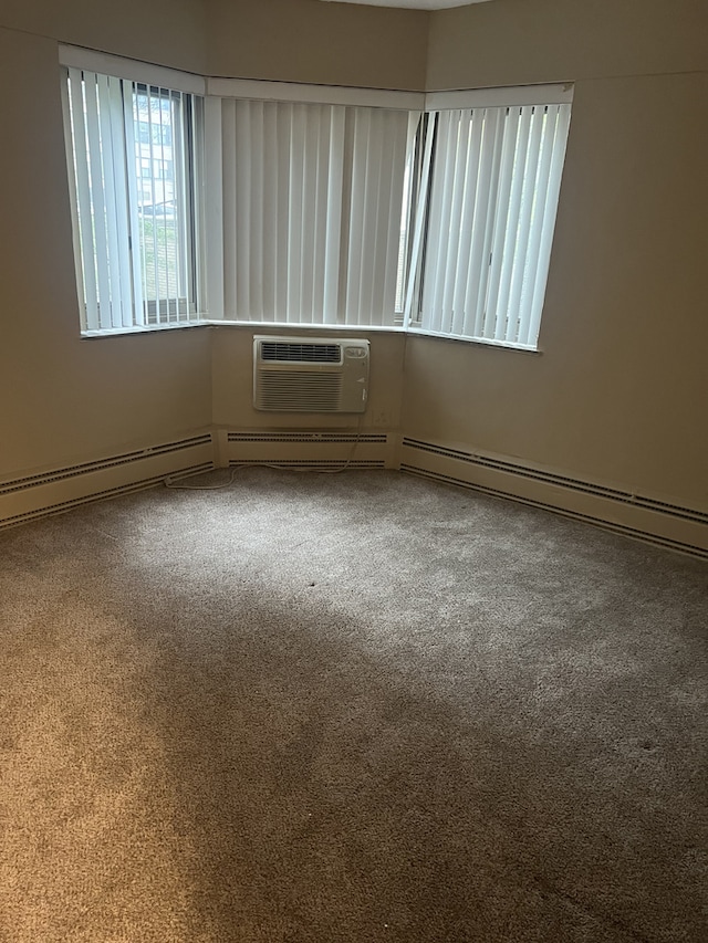 7337 S S Shore Dr Unit 216, Chicago, IL 60649 - carpeted spare room featuring an AC wall unit