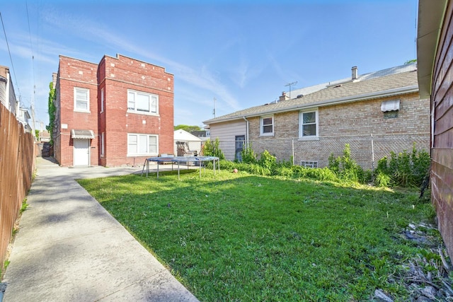 1738 N Latrobe Ave, Chicago, IL 60639 - view of yard with a trampoline