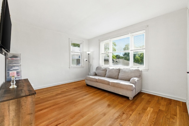 1738 N Latrobe Ave, Chicago, IL 60639 - living area featuring light wood-style flooring and baseboards