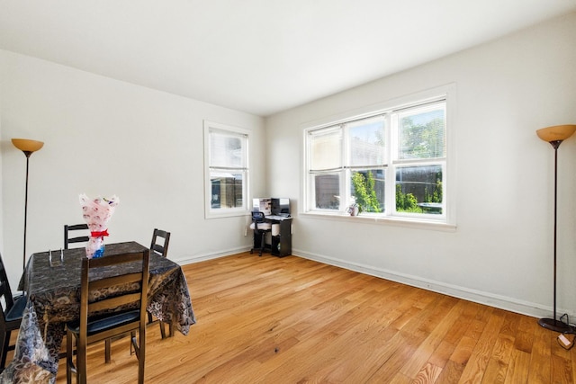 1738 N Latrobe Ave, Chicago, IL 60639 - dining area featuring light wood-style floors and baseboards