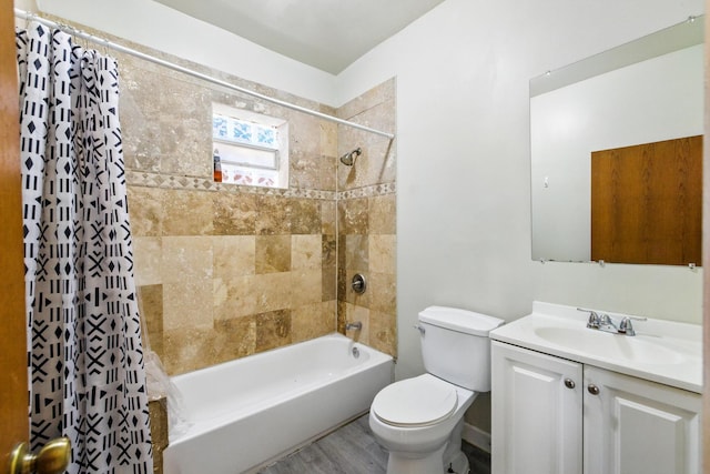 1738 N Latrobe Ave, Chicago, IL 60639 - bathroom with shower / bathtub combination with curtain, toilet, vanity, and wood finished floors