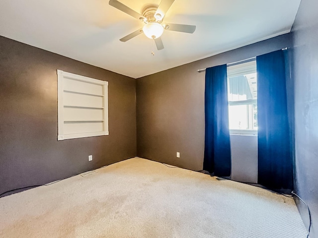 378 E Union St, Seneca, IL 61360 - carpeted spare room with a ceiling fan and built in features