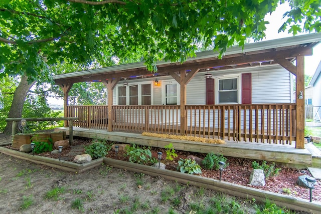 378 E Union St, Seneca, IL 61360 - view of front of property with a ceiling fan and a deck