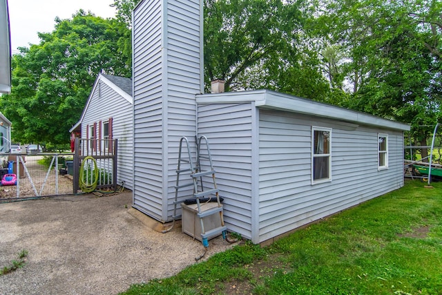 378 E Union St, Seneca, IL 61360 - view of side of property with a chimney