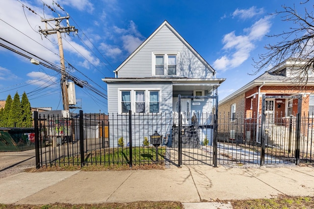 7115 S Rockwell St, Chicago, IL 60629 - view of front facade featuring a porch, a fenced front yard, and a gate