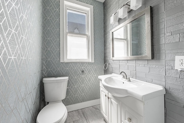 7115 S Rockwell St, Chicago, IL 60629 - bathroom with vanity, toilet, and baseboards