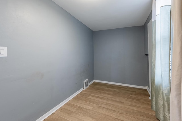 7115 S Rockwell St, Chicago, IL 60629 - unfurnished room featuring light wood-type flooring and baseboards