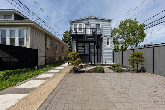 7115 S Rockwell St, Chicago, IL 60629 - view of front facade with a patio
