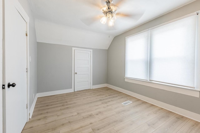 7115 S Rockwell St, Chicago, IL 60629 - bonus room with lofted ceiling, a ceiling fan, light wood-style floors, and baseboards