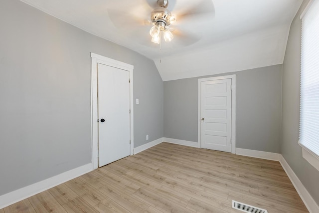 7115 S Rockwell St, Chicago, IL 60629 - additional living space featuring a ceiling fan, vaulted ceiling, light wood-style flooring, and baseboards