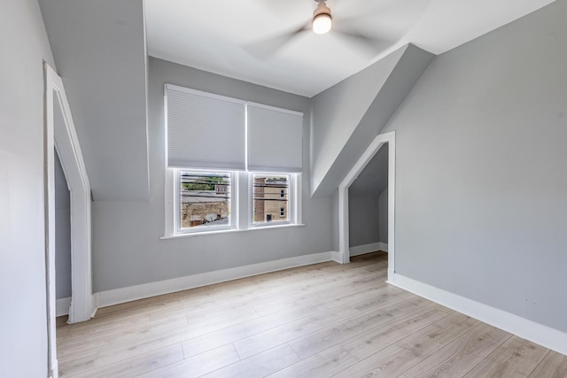 7115 S Rockwell St, Chicago, IL 60629 - additional living space with a ceiling fan, wood finished floors, and baseboards