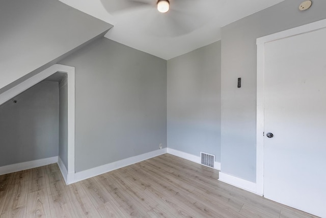 7115 S Rockwell St, Chicago, IL 60629 - additional living space with a ceiling fan, light wood finished floors, lofted ceiling, and baseboards