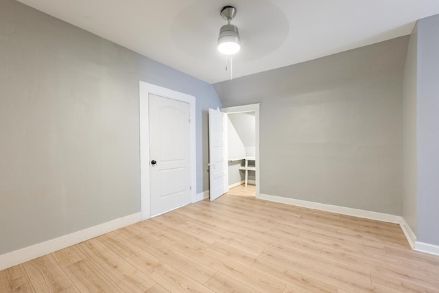 7115 S Rockwell St, Chicago, IL 60629 - spare room featuring a ceiling fan, light wood-type flooring, and baseboards