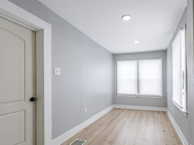 7115 S Rockwell St, Chicago, IL 60629 - spare room featuring light wood finished floors, baseboards, and recessed lighting