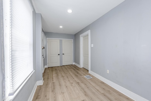 7115 S Rockwell St, Chicago, IL 60629 - hallway featuring light wood-type flooring, baseboards, and recessed lighting