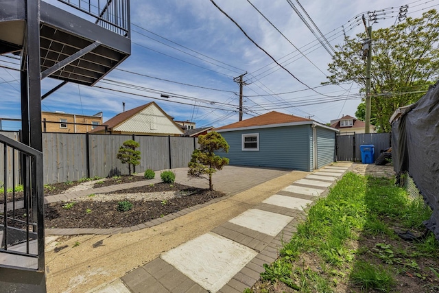 7115 S Rockwell St, Chicago, IL 60629 - fenced backyard with a patio area