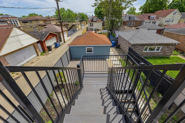 7115 S Rockwell St, Chicago, IL 60629 - wooden deck featuring stairs, a residential view, and a fenced backyard