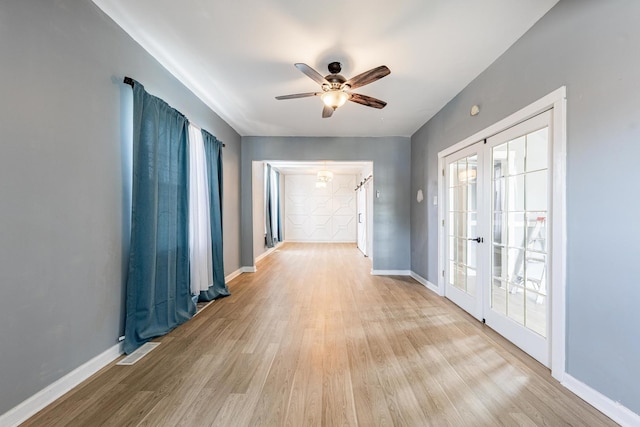 7115 S Rockwell St, Chicago, IL 60629 - corridor featuring light wood-style flooring, baseboards, and french doors