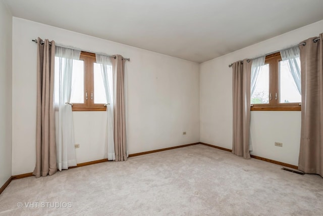 735 Vermont Rd, Frankfort, IL 60423 - unfurnished room featuring plenty of natural light, light carpet, and baseboards