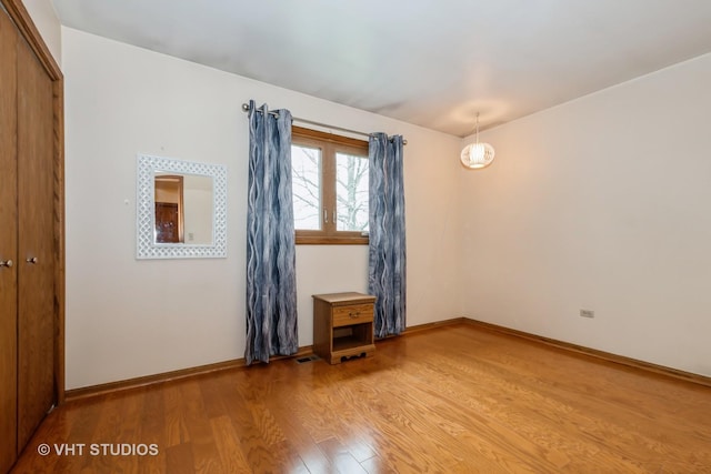 735 Vermont Rd, Frankfort, IL 60423 - unfurnished room with light wood-style floors and baseboards