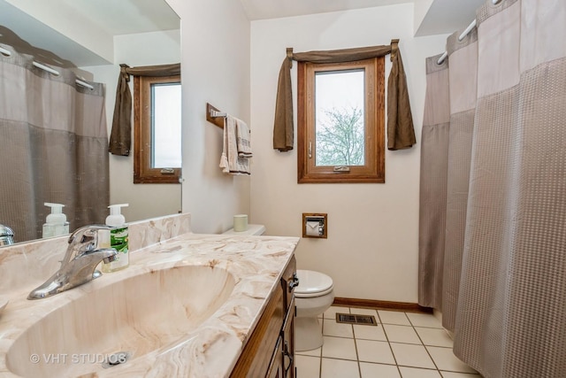 735 Vermont Rd, Frankfort, IL 60423 - bathroom featuring toilet, vanity, tile patterned floors, curtained shower, and baseboards