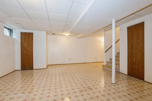 735 Vermont Rd, Frankfort, IL 60423 - below grade area with a paneled ceiling, stairs, and tile patterned floors