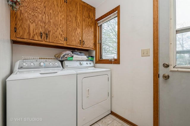 735 Vermont Rd, Frankfort, IL 60423 - laundry room with cabinet space, washing machine and clothes dryer, light tile patterned floors, and baseboards