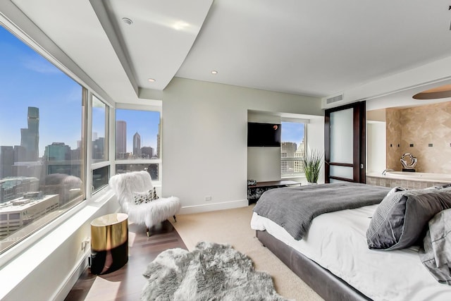 800 N Michigan Ave Unit 4801, Chicago, IL 60611 - bedroom with a skyline view and baseboards