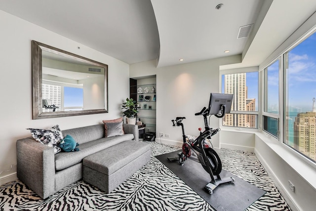 800 N Michigan Ave Unit 4801, Chicago, IL 60611 - workout room featuring baseboards, a city view, and recessed lighting