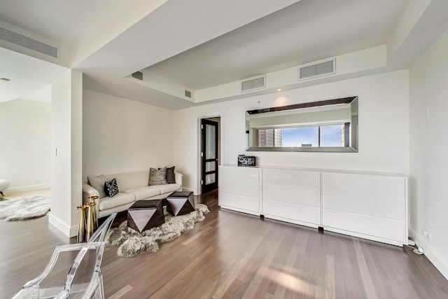 800 N Michigan Ave Unit 4801, Chicago, IL 60611 - living room with wood finished floors, a raised ceiling, and baseboards