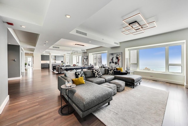 800 N Michigan Ave Unit 4801, Chicago, IL 60611 - living room featuring wood finished floors, baseboards, and recessed lighting