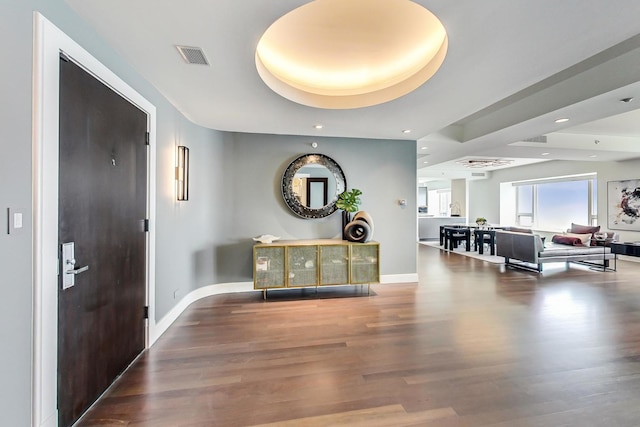 800 N Michigan Ave Unit 4801, Chicago, IL 60611 - entryway with recessed lighting, a tray ceiling, wood finished floors, and baseboards