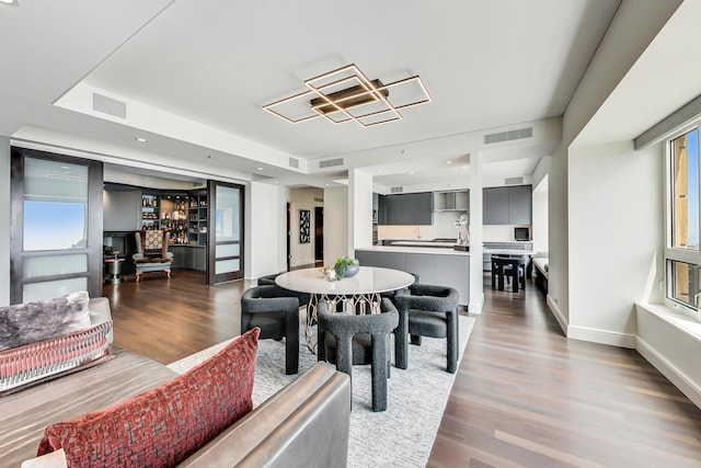 800 N Michigan Ave Unit 4801, Chicago, IL 60611 - dining room featuring healthy amount of natural light, wood finished floors, and baseboards