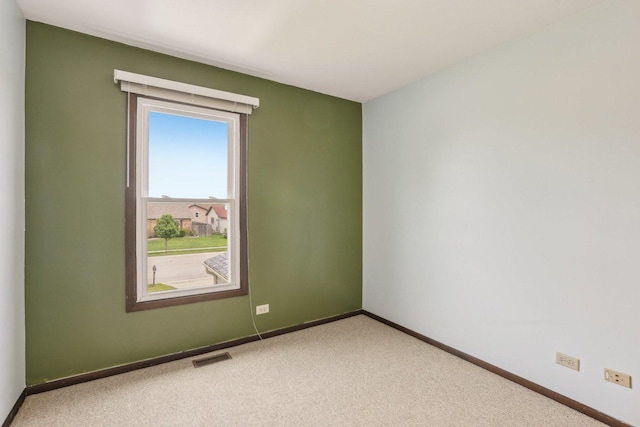 143 Hesterman Dr, Glendale Heights, IL 60139 - carpeted spare room with baseboards