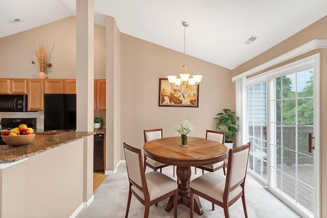 2422 Georgetown Cir, Aurora, IL 60503 - dining space featuring vaulted ceiling, a chandelier, light colored carpet, and baseboards