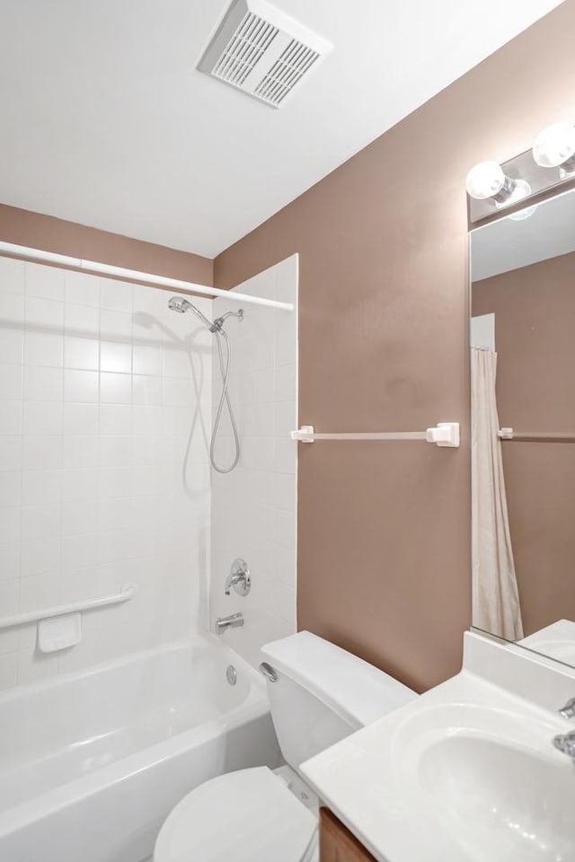 2422 Georgetown Cir, Aurora, IL 60503 - bathroom featuring toilet, shower / bathtub combination with curtain, and vanity