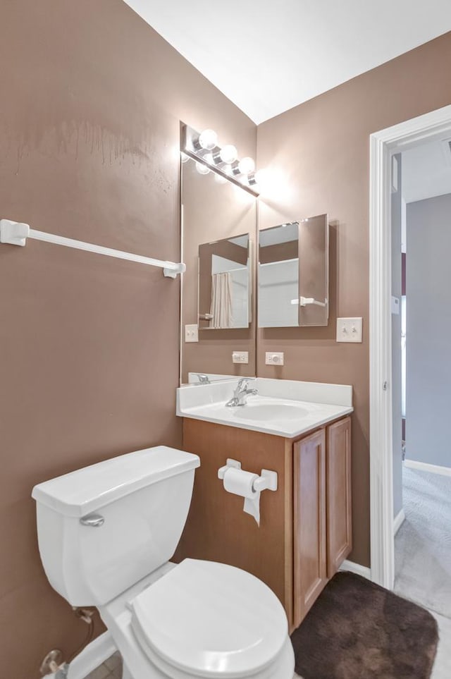 2422 Georgetown Cir, Aurora, IL 60503 - half bath featuring toilet, vanity, and baseboards