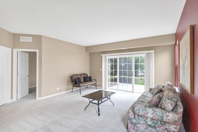2422 Georgetown Cir, Aurora, IL 60503 - living area featuring carpet flooring and baseboards