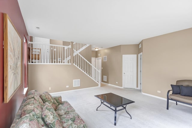 2422 Georgetown Cir, Aurora, IL 60503 - living room featuring carpet, stairs, and baseboards