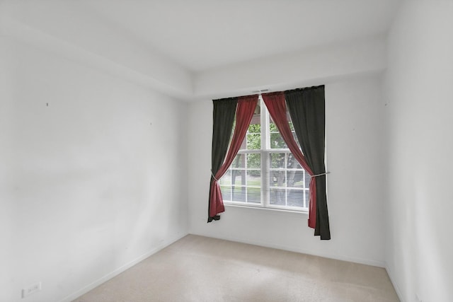 2422 Georgetown Cir, Aurora, IL 60503 - spare room featuring light carpet and baseboards