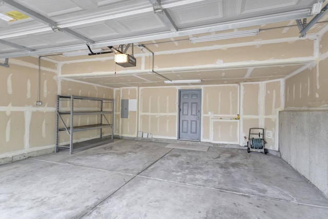 2422 Georgetown Cir, Aurora, IL 60503 - garage with a garage door opener and electric panel