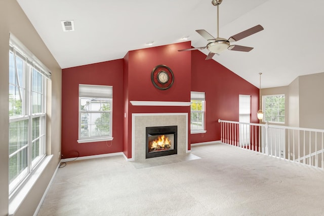 2422 Georgetown Cir, Aurora, IL 60503 - unfurnished living room with carpet, baseboards, a tile fireplace, ceiling fan, and high vaulted ceiling
