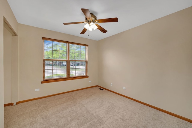 1039 Stewart Ct, Joliet, IL 60431 - empty room with baseboards, carpet, and ceiling fan