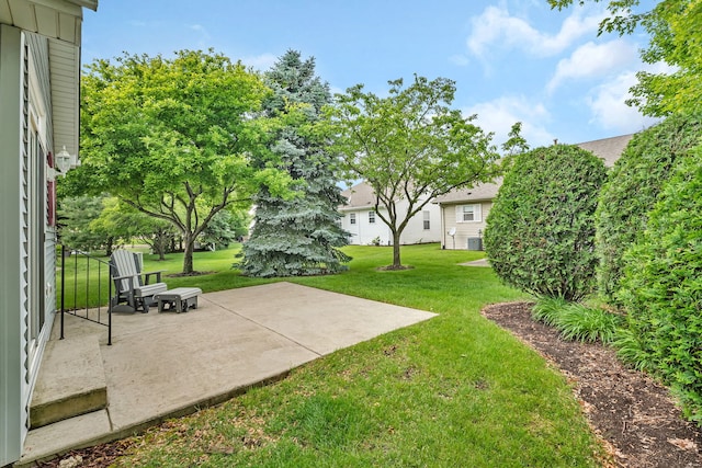 1039 Stewart Ct, Joliet, IL 60431 - view of grassy yard featuring a patio area and central AC unit
