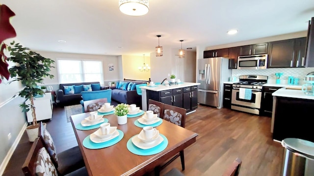 1427 Hampton Ln, Schaumburg, IL 60193 - dining room featuring a chandelier and dark wood finished floors