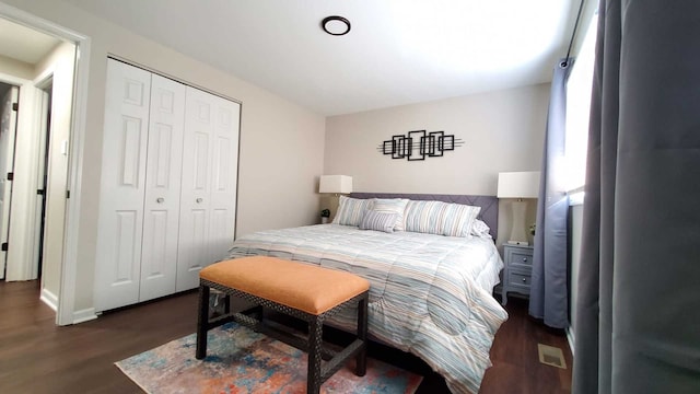 1427 Hampton Ln, Schaumburg, IL 60193 - bedroom featuring dark wood-style flooring and a closet