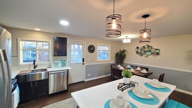 1427 Hampton Ln, Schaumburg, IL 60193 - dining area with dark wood-style flooring, baseboards, and recessed lighting