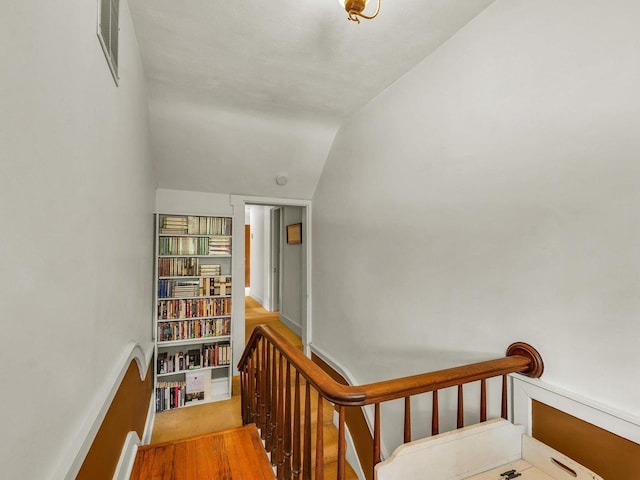 611 S Lynn St, Champaign, IL 61820 - stairway with vaulted ceiling, carpet flooring, and baseboards